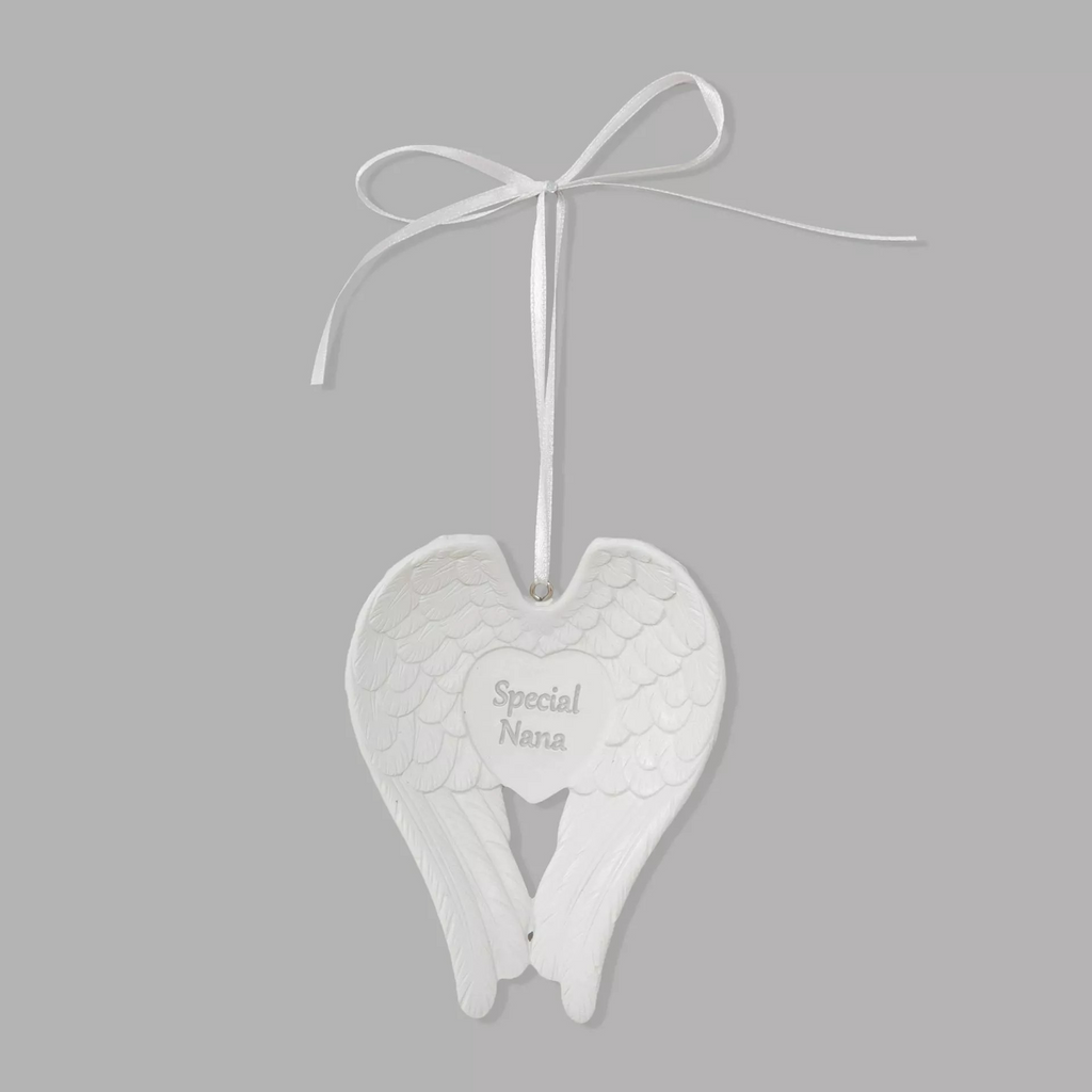 White angel wings with 'special nana' written on a love heart joining the two wings together. Hanging from a piece of white ribbon tied in a bow.