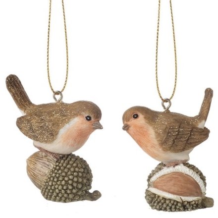 Two bird-shaped Christmas ornaments on white background
