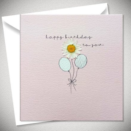 lilac square card with the balloons tied together with a pressed daisy flower in between them ,and the words 'happy birthday to you' written in a script font above.