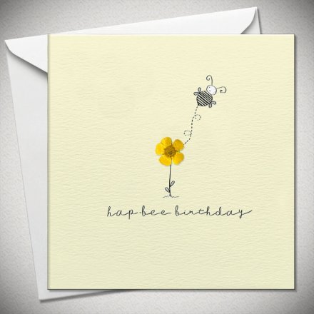 pastel yellow card with a buttercup flower in the middle with a cartoon bee flying off it. Underneath it says 'hap-bee birthday' in script font.