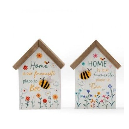 White house with wooden top. Flowers on the bottom of the house. On the house is the quote 'Home is our favourite place to bee'. Features a 3D bee. 