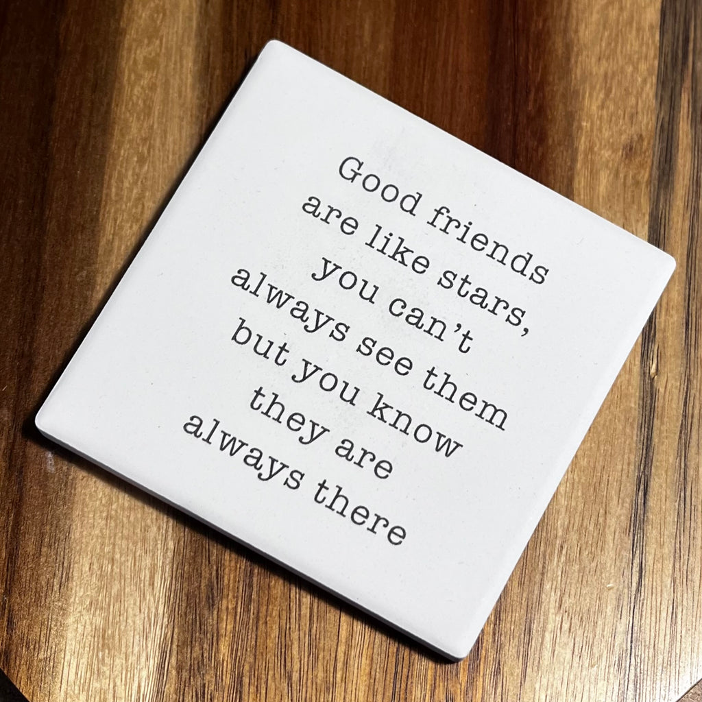 Square white coaster with the quote 'Good friends are like stars, you can't always see them but you know they are always there' in typewriter font