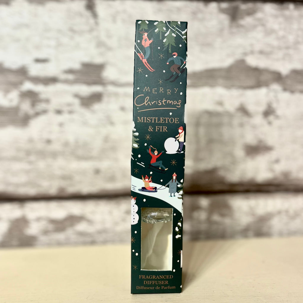 Fragranced diffuser packaging with Christmas design on a neutral background