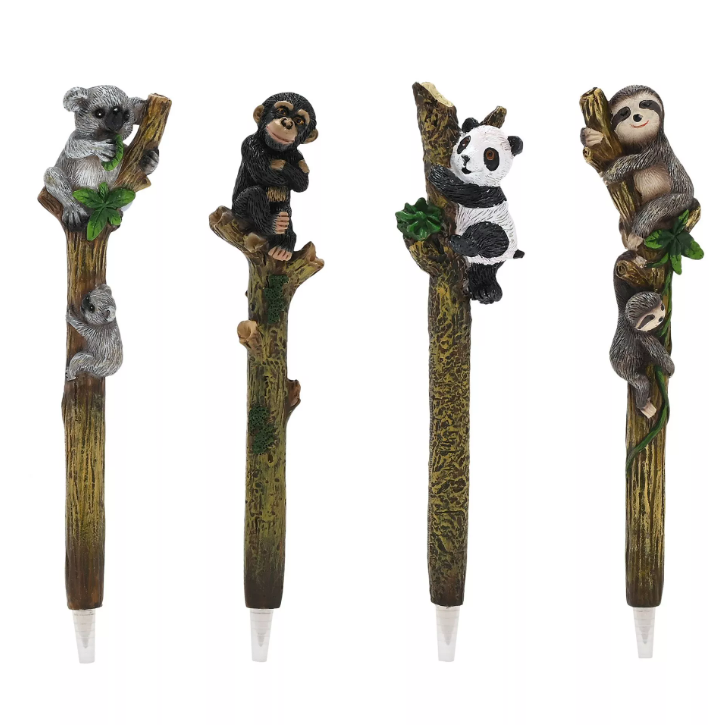 Ballpoint pens in a tree trunk design with either two koalas, two sloths, a chimpanzee, or a panda sat at the top of the pens. 