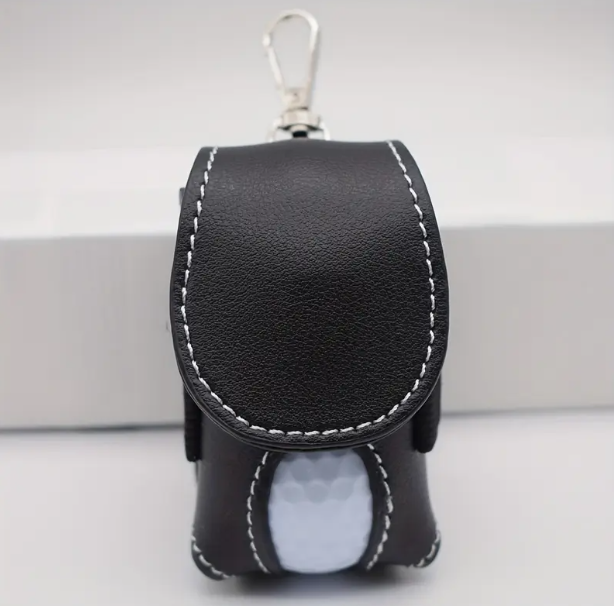 Black leather keychain pouch with a golf ball 