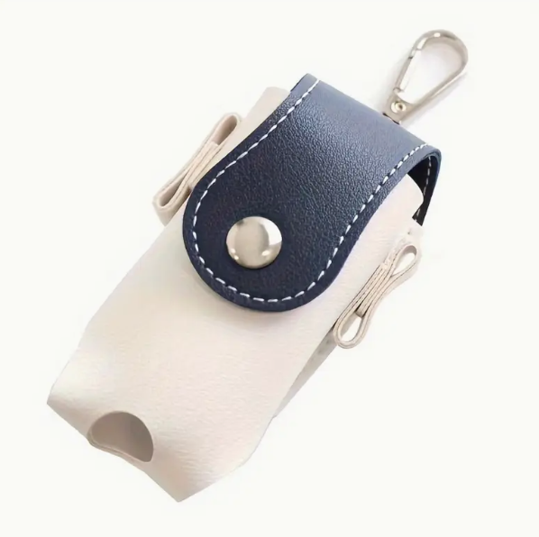 White and blue leather keychain pouch on a white background