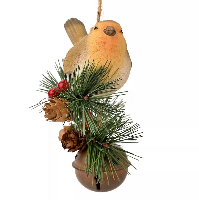 Decorative bird ornament with pine branches, cones, and berries on a white background