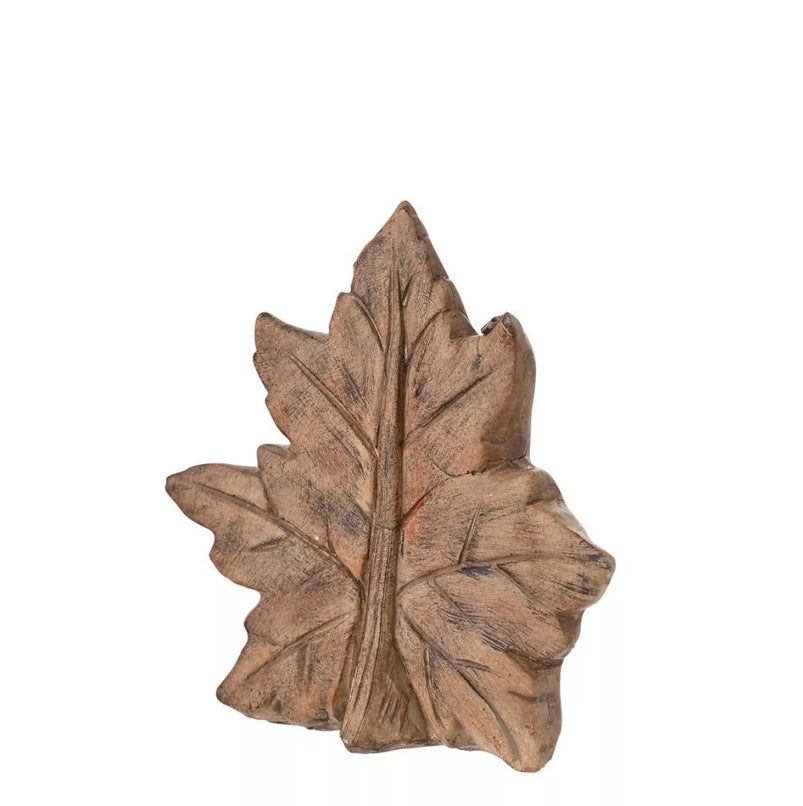 Wooden leaf shape decoration on white background
