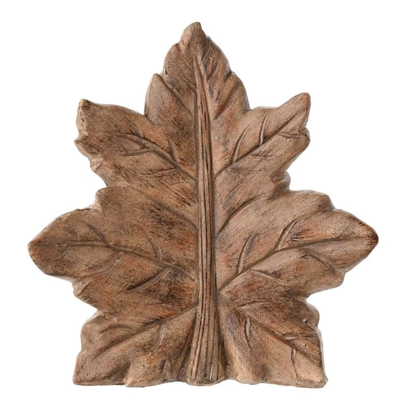 Standing wooden leaf-shaped decoration on a white background 