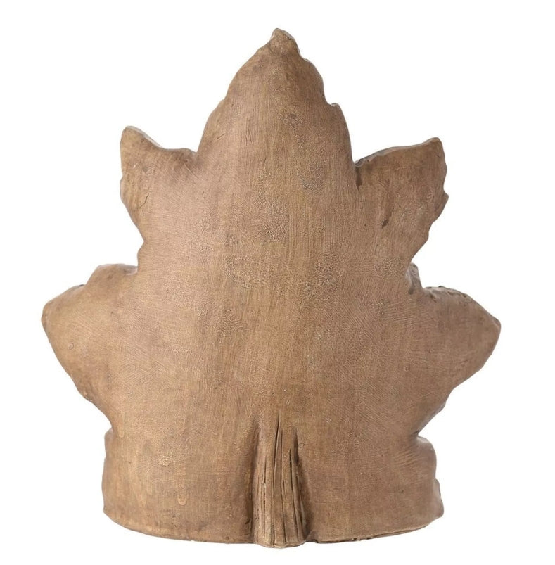 Standing wooden leaf-shaped decoration on a white background 