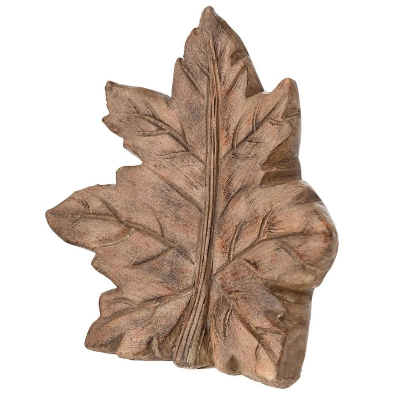 Standing wooden leaf-shaped decoration on a white background 