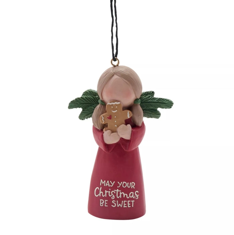 Decorative angel ornament holding a gingerbread man with 'May your Christmas be sweet' text on a white background.
