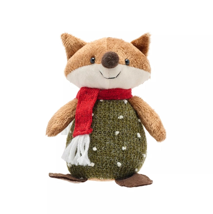 Plush toy fox with a red scarf on a white background