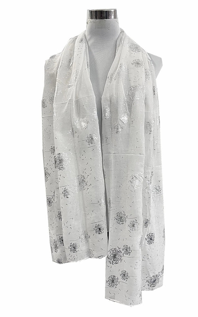 White scarf with black floral pattern on a mannequin against a white background