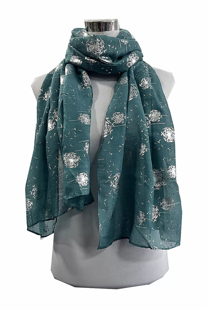 Teal scarf with floral pattern on a mannequin against a white background